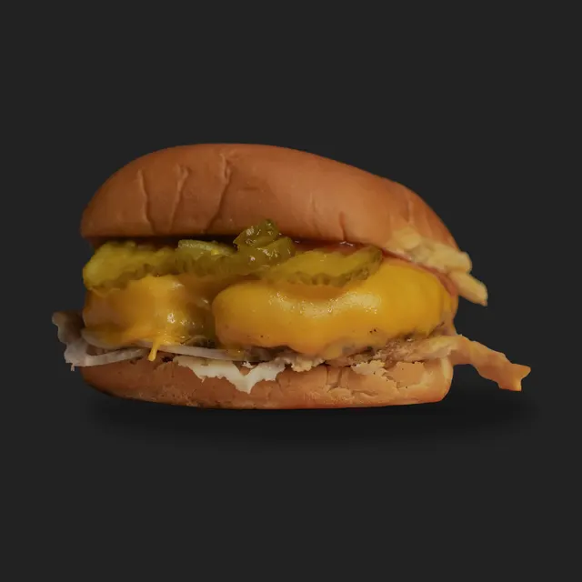OG CheeseBurger from the Sizzld menu, cut out on charcoal, photographed and edited by Konquer