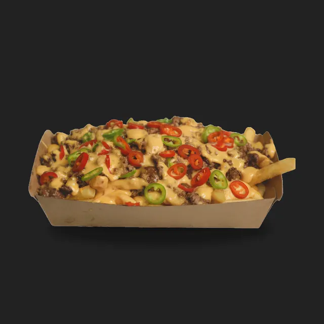 Smash Loaded Fries from the Sizzld menu, cut out on charcoal, photographed and edited by Konquer